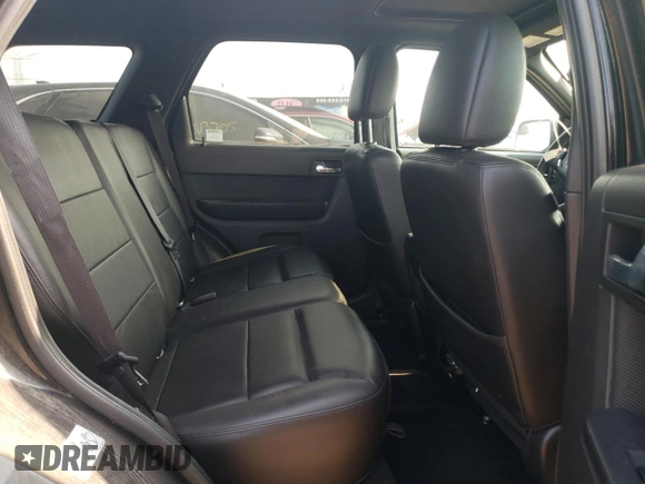 2010 Ford Escape Limited z VIN 1FMCU9EG7AKC73014, wystawiony jako Copart lot #59350805 z przebiegiem 53 032 mil mil oraz Szkoda całkowita • Salvage title. Historia ofert i sprzedaży dostępna na DreamBid. Obrazek 10.