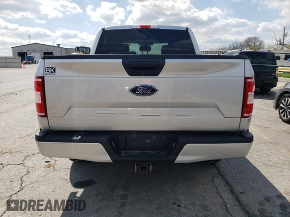 2018 Ford F-150 XL with VIN 1FTEW1C54JKF74723, listed as a Copart auction lot 52547465 with 107,232 mi miles and Salvage title. Bid and sale history available at DreamBid. Image 6.