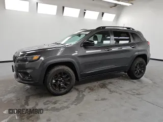 2022 Jeep Cherokee X with VIN 1C4PJMCX0ND555946, listed as a Copart auction lot 59865895 with 57,894 mi miles and Clean title. Bid and sale history available at DreamBid. Image 1.