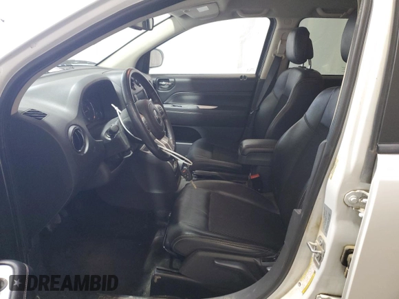 2017 Jeep Compass High Altitude with VIN 1C4NJDEB8HD176433, listed as a Copart auction lot 70813384 with 79,950 mi miles and Salvage title. Bid and sale history available at DreamBid. Image 7.