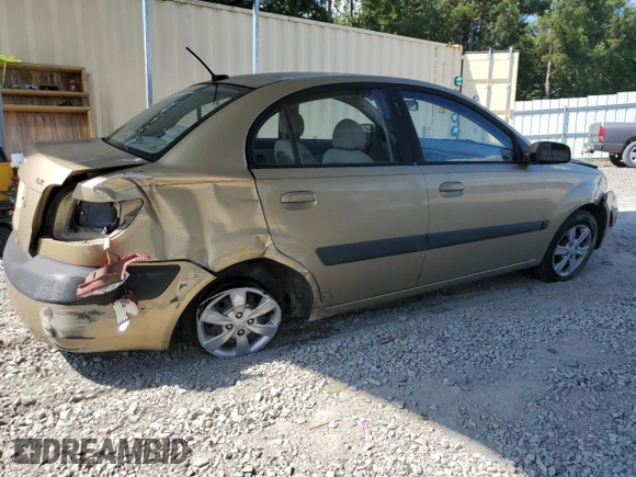2009 Kia Rio LX with VIN KNADE223996521831, listed as a Copart auction lot 69126284 with 183,796 mi miles and Salvage Title. Bid and sale history available at DreamBid. Image 3.