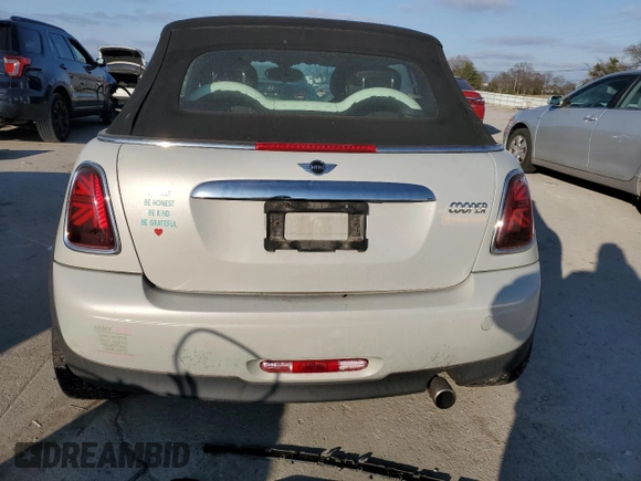 2013 MINI Convertible z VIN WMWZN3C59DT266152, wystawiony jako Copart lot #83379704 z przebiegiem 88 272 mil mil oraz Szkoda całkowita • Salvage title. Historia ofert i sprzedaży dostępna na DreamBid. Obrazek 6.