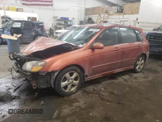2009 Kia Spectra with VIN KNAFE241995025583, listed as a Copart auction lot 45626095 with 297,361 mi miles and Salvage Title. Bid and sale history available at carsss.com. Image 1.