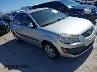 2008 Kia Rio LX with VIN KNADE123X86329097, listed as a IAAI auction lot 41822420 with 180,462 mi miles. Bid and sale history available at carsss.com. Image 1.