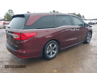 2019 Honda Odyssey Touring with VIN 5FNRL6H82KB060023, listed as a IAAI auction lot 41451199 with 82,994 mi miles. Bid and sale history available at carsss.com. Image 4.