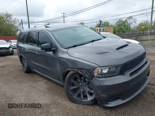 2018 Dodge Durango R/T with VIN 1C4SDJCT0JC372124, listed as a IAAI auction lot 42259990 with 131,414 mi miles and . Bid and sale history available at DreamBid. Image 1.