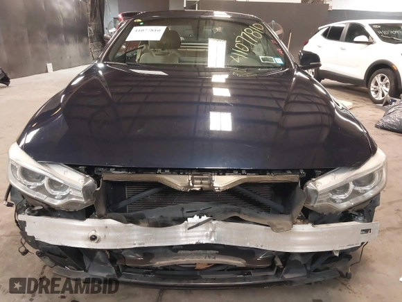 2015 BMW 4 Series 428i xDrive with VIN WBA3T1C59FP820155, listed as a IAAI auction lot 41077810 with 78,029 mi miles and . Bid and sale history available at carsss.com. Image 6.