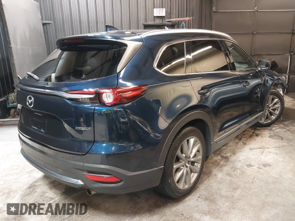 2020 Mazda CX-9 Grand Touring with VIN JM3TCBDY4L0403376, listed as a IAAI auction lot 42357363 with 86,716 mi miles and . Bid and sale history available at DreamBid. Image 4.