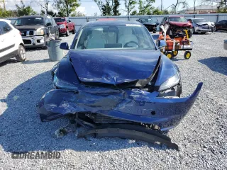 2025 Tesla Model 3 Long Range with VIN 5YJ3E1EA1SF887750, listed as a Copart auction lot 51348825 with 5,530 mi miles and Salvage Title. Bid and sale history available at DreamBid. Image 5.