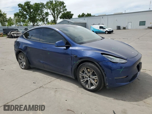 2021 Tesla Model Y Long Range with VIN 5YJYGDEE3MF094165, listed as a Copart auction lot 52907835 with 141,260 mi miles and Salvage Title. Bid and sale history available at DreamBid. Image 4.