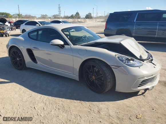 2024 Porsche 718 Cayman with VIN WP0AA2A82RK255106, listed as a Copart auction lot 46917485 with 13,662 mi miles and Salvage Title. Bid and sale history available at carsss.com. Image 4.