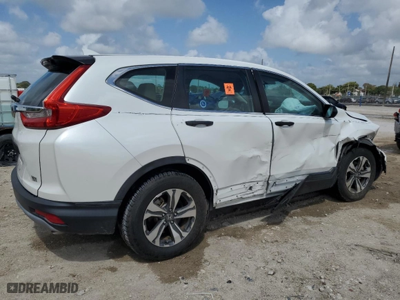 2019 Honda CR-V LX with VIN 2HKRW5H3XKH411672, listed as a Copart auction lot 51619395 with 43,629 mi miles and Salvage Title. Bid and sale history available at carsss.com. Image 3.