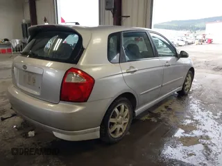 2006 Kia Spectra with VIN KNAFE161X65283615, listed as a IAAI auction lot 41955968 with 185,177 mi miles. Bid and sale history available at carsss.com. Image 4.