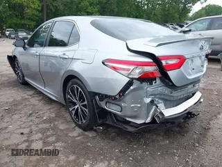2018 Toyota Camry LE z VIN 4T1B11HK3JU129549, wystawiony jako IAAI lot #42159243 z przebiegiem 76 299 mil mil oraz . Historia ofert i sprzedaży dostępna na DreamBid. Obrazek 3.
