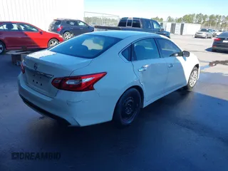 2016 Nissan Altima SV with VIN 1N4AL3AP6GC228866, listed as a IAAI auction lot 41801428 with 170,564 mi miles and . Bid and sale history available at DreamBid. Image 4.