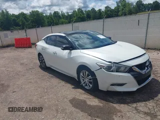 2016 Nissan Maxima SV z VIN 1N4AA6AP9GC405143, wystawiony jako IAAI lot #42341288 z przebiegiem 130 704 mil mil oraz . Historia ofert i sprzedaży dostępna na DreamBid. Obrazek 1.