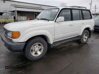 1995 Toyota Land Cruiser z VIN JT3DJ81W1S0100700, wystawiony jako Copart lot #46906015 z przebiegiem 172 082 mil mil oraz Czysty tytuł • Clean title. Historia ofert i sprzedaży dostępna na DreamBid. Obrazek 1.