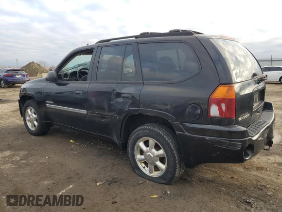 2006 GMC Envoy SLT with VIN 1GKDS13S762343520, listed as a Copart auction lot 82714134 with 0 mi miles and Clean Title. Bid and sale history available at carsss.com. Image 2.