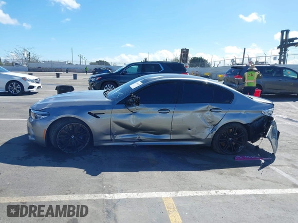 2020 BMW M5 Competition z VIN WBSJF0C05LB448878, wystawiony jako IAAI lot #41796245 z przebiegiem 62 856 mil mil oraz . Historia ofert i sprzedaży dostępna na DreamBid. Obrazek 13.