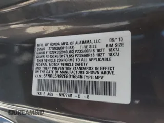 2014 Honda Odyssey Touring with VIN 5FNRL5H92EB016546, listed as a IAAI auction lot 41689148 with 143,601 mi miles and . Bid and sale history available at DreamBid. Image 9.