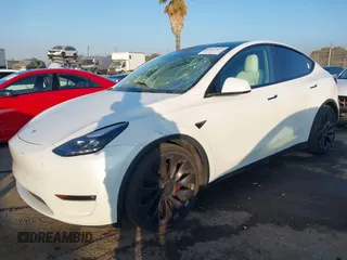 2021 Tesla Model Y Performance with VIN 5YJYGDEF2MF258711, listed as a IAAI auction lot 41367832 with 47,662 mi miles and . Bid and sale history available at DreamBid. Image 19.