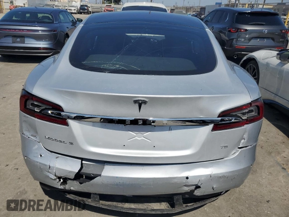 2017 Tesla Model S 60 with VIN 5YJSA1E17HF189627, listed as a Copart auction lot 64454635 with 106,003 mi miles and Salvage title. Bid and sale history available at DreamBid. Image 6.