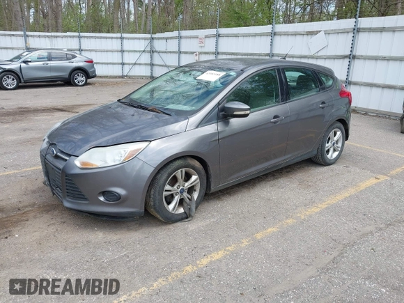 2014 Ford Focus SE with VIN 1FADP3K2XEL326882, listed as a IAAI auction lot 42183188 with 101,450 mi miles and . Bid and sale history available at carsss.com. Image 2.