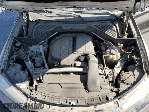 2016 BMW X6 sDrive35i with VIN 5UXKU0C58G0F93204, listed as a Copart auction lot 73562584 with 137,462 mi miles and Salvage Title. Bid and sale history available at carsss.com. Image 12.