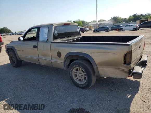 2002 Dodge Dakota with VIN 1B7GL12X02S545788, listed as a Copart auction lot 69987164 with 247,912 mi miles and Salvage Title. Bid and sale history available at carsss.com. Image 2.