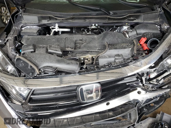 2023 Honda Odyssey Elite with VIN 5FNRL6H98PB056770, listed as a Copart auction lot 56984055 with Not provided miles and Salvage title. Bid and sale history available at DreamBid. Image 12.