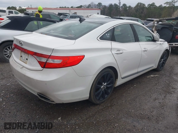 2013 Hyundai Azera with VIN KMHFH4JG0DA216691, listed as a IAAI auction lot 41704694 with 200,228 mi miles and . Bid and sale history available at DreamBid. Image 4.