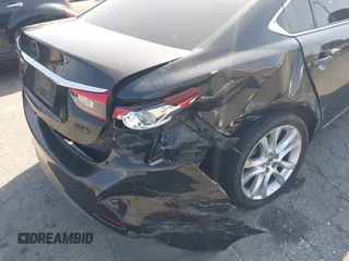 2016 Mazda 6 i Touring with VIN JM1GJ1V57G1444843, listed as a IAAI auction lot 41920436 with 154,863 mi miles and . Bid and sale history available at DreamBid. Image 6.
