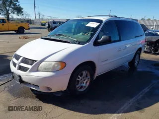 2001 Dodge Grand Caravan with VIN 2B4GT44L11R179428, listed as a IAAI auction lot 41648424 with 179,241 mi miles and . Bid and sale history available at DreamBid. Image 2.