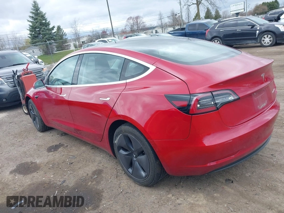 2018 Tesla Model 3 Long Range Battery with VIN 5YJ3E1EB3JF129772, listed as a IAAI auction lot 42017305 with 103,825 mi miles and . Bid and sale history available at DreamBid. Image 3.