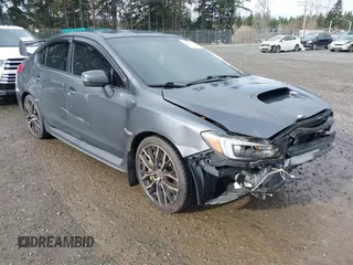 2020 Subaru WRX STI with VIN JF1VA2E60L9817275, listed as a IAAI auction lot 41443382 with 26,374 mi miles. Bid and sale history available at carsss.com. Image 1.
