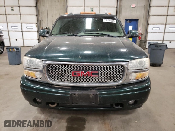 2003 GMC Sierra Denali z VIN 2GTFK69U531392799, wystawiony jako Copart lot #78530804 z przebiegiem 179 365 mil mil oraz Tytuł czysty. Historia ofert i sprzedaży dostępna na DreamBid. Obrazek 5.