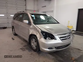 2006 Honda Odyssey EX-L z VIN 5FNRL38746B461357, wystawiony jako IAAI lot #41040746 z przebiegiem 256 047 mil mil oraz . Historia ofert i sprzedaży dostępna na DreamBid. Obrazek 1.