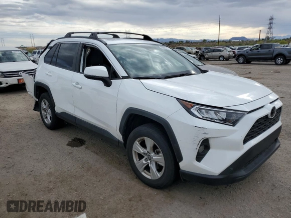 2019 Toyota RAV4 XLE with VIN 2T3W1RFVXKW043919, listed as a Copart auction lot 52998715 with 55,593 mi miles and Salvage Title. Bid and sale history available at carsss.com. Image 4.