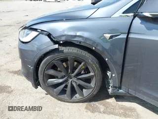 2017 Tesla Model X 90D with VIN 5YJXCBE22HF079194, listed as a IAAI auction lot 41895591 with 102,437 mi miles and . Bid and sale history available at DreamBid. Image 6.