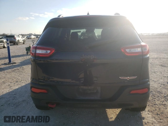 2016 Jeep Cherokee Trailhawk with VIN 1C4PJMBS0GW142339, listed as a Copart auction lot 43846075 with 186,354 mi miles and Clean title. Bid and sale history available at DreamBid. Image 6.