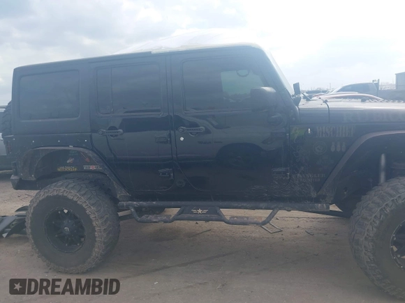2014 Jeep Wrangler Unlimited Rubicon X with VIN 1C4HJWFG3EL274905, listed as a IAAI auction lot 41512631 with 123,961 mi miles and . Bid and sale history available at DreamBid. Image 14.