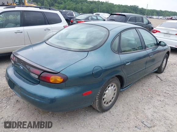 1996 Ford Taurus LX with VIN 1FALP53S3TG177324, listed as a IAAI auction lot 42622520 with 126,979 mi miles and . Bid and sale history available at DreamBid. Image 4.