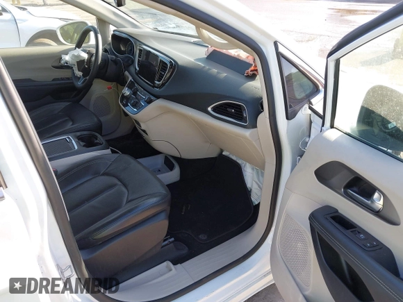 2022 Chrysler Pacifica Touring L with VIN 2C4RC1BGXNR233654, listed as a IAAI auction lot 42137632 with 73,899 mi miles and . Bid and sale history available at DreamBid. Image 5.