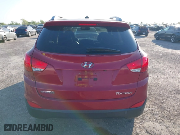 2013 Hyundai Tucson GLS with VIN KM8JU3AC6DU763590, listed as a IAAI auction lot 41999555 with 149,960 mi miles. Bid and sale history available at carsss.com. Image 16.