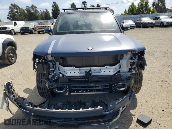 2023 Rivian R1S Adventure z VIN 7PDSGBBA5PN024306, wystawiony jako Copart lot #53980375 z przebiegiem 10 389 mil mil oraz Szkoda całkowita • Salvage title. Historia ofert i sprzedaży dostępna na DreamBid. Obrazek 5.