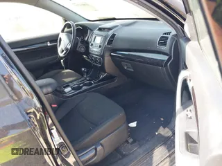 2014 Kia Sorento LX with VIN 5XYKT4A73EG482046, listed as a IAAI auction lot 41811727 with 157,845 mi miles and . Bid and sale history available at carsss.com. Image 5.