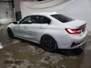 2019 BMW 3 Series 330i xDrive with VIN WBA5R7C59KAJ81850, listed as a Copart auction lot 88526315 with 64,770 mi miles and Salvage title. Bid and sale history available at DreamBid. Image 2.