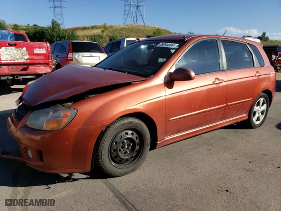 2007 Kia Spectra with VIN KNAFE162X75009714, listed as a Copart auction lot 69094894 with 206,173 mi miles and Salvage Title. Bid and sale history available at carsss.com. Image 1.