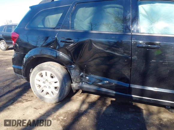 2019 Dodge Journey SE with VIN 3C4PDCBG6KT874924, listed as a IAAI auction lot 41426744 with 60,479 mi miles and . Bid and sale history available at DreamBid. Image 6.