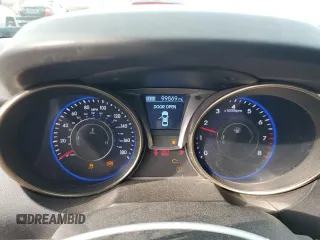 2013 Hyundai Genesis Coupe Track z VIN KMHHU6KJ4DU089727, wystawiony jako Copart lot #50002495 z przebiegiem 99 869 mil mil oraz Szkoda całkowita • Salvage title. Historia ofert i sprzedaży dostępna na DreamBid. Obrazek 9.